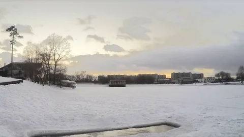 Icehole on the pond in winter timelapse 動画素材 79814951