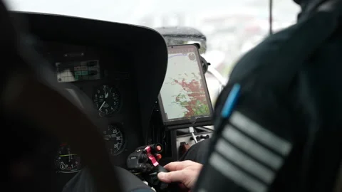 Iceland - 20 August 2025 Pilot Helicopter Flight Controls with Navigation Tablet Stock Footage 319699096