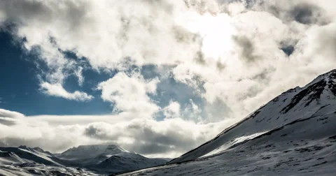Iceland, Akureyi Clouds rolling over mountains in winter Video stock 61782211