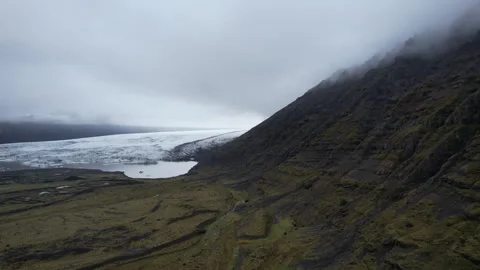 Iceland Drone flying Pan to the left Reveals glacier far away 4K 動画素材 241951153