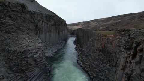 Iceland Drone flying through Studlagil canyon walls 4K 動画素材 242120739