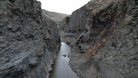 Iceland Drone going through Studlagil Canyon Walls 4K 動画素材 242120680