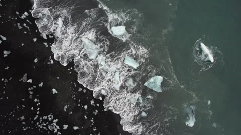 Iceland Drone rotation down at Diamond Beach 4K Video stock 242117752