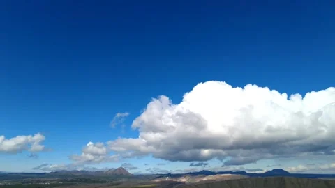 Iceland Hyperlapse Cloud Formation Moving Across Blue Sky Over Highland Stock Footage 345223849