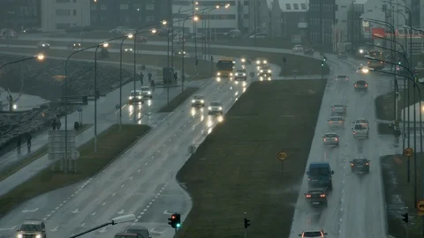 Iceland Reykjavik City SaebrautStreet rain Stock Footage