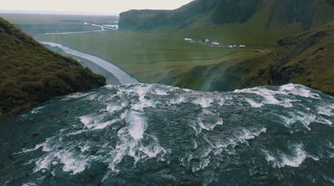 Iceland Skogafoss Waterfall Reveal Drone Shot  Stock Footage 64979237