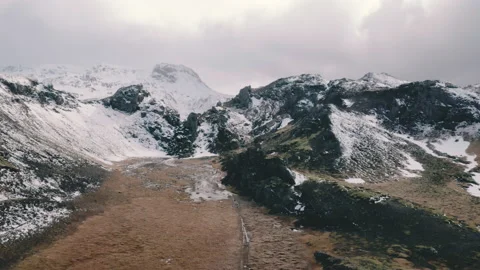 Iceland snow-capped mountain landscape - scenic stunning epic drone view Stock Footage 233183802