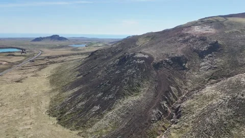 Iceland Spring View of Mountain Ridge and Surrounding Landscape Stock Footage 309833648