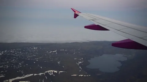 Iceland view through airplane window Video stock 82321933