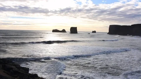 Iceland vik south coast cliffs on the coast shore ocean and waves and sunsh.. Stock Footage 72927451