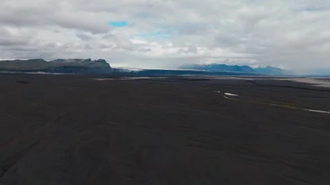 Iceland Volcanic Plains with Distant Glacier and Mountains 動画素材 342708499