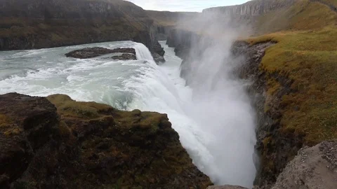 Iceland waterfall on the background of mountains. Stock Footage 96387793