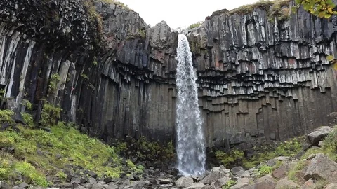 Iceland waterfall on the background of mountains. Stock Footage 96388751