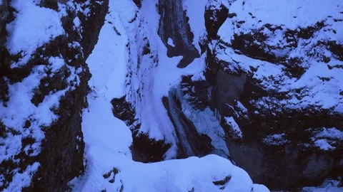 Iceland Winter View Of Large Snow Covered Valley With Tall Waterfall 1 Video stock 87490130