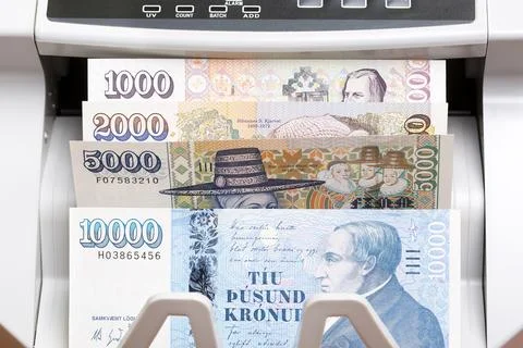 Icelandic crown in the counting machine Stock Photos