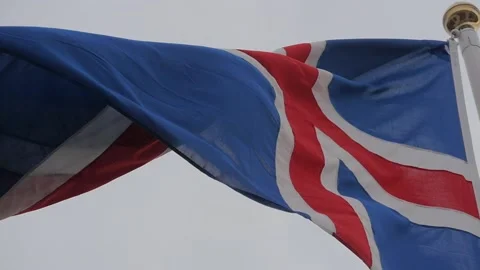 The Icelandic flag waving in the wind in slow motion Stock Footage 150740411