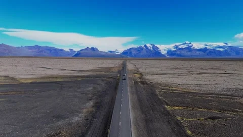 Icelandic Road Across a Barren Plain as the Viewpoint Advances Video stock 342267415