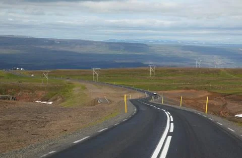 Icelandic road with clouds 스톡 사진