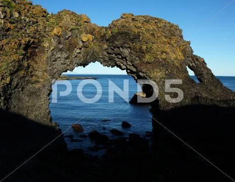 Icelandic sea arch.jpg Stock Photos