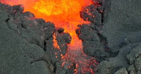 Icelandic Volcano eruption with glowing Red lava bursting to the surface Stock Footage 310160739