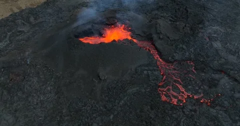Icelandic Volcano eruption with glowing Red lava bursting to the surface Stock Footage 310160833