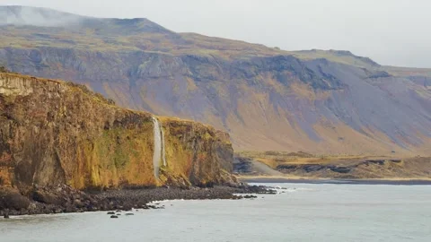 Icelandic Waterfall and Coastal Cliffs Stock Footage 320202548