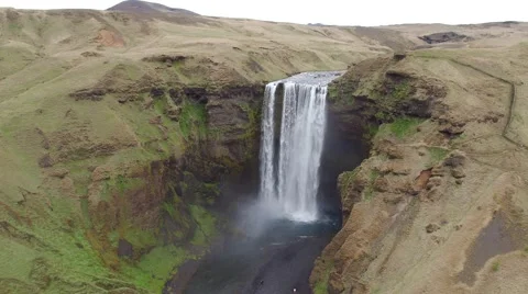 ICELANDIC WATERFALL DRONE GOING DOWN SKOGAFOSS Stock Footage 67605585