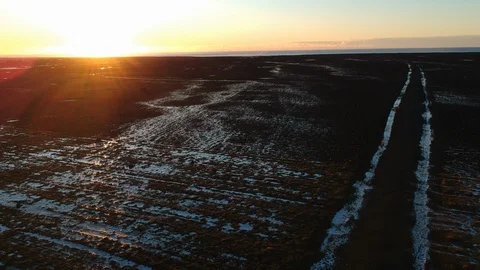 Icey landscape during sunset - drone shot Video stock 107883196