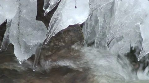 Icicle and river Stock Footage 982830