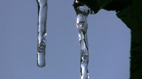Icicle bubbles while melting Stock Footage 362407