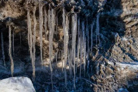Icicle, icy stalactite. Stock Photos