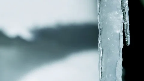 Icicle melting in slow motion - close up on ice Stock Footage 71526436