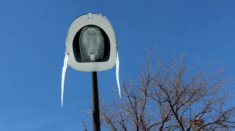 Icicle on a street lamp. Stock Footage 34509805