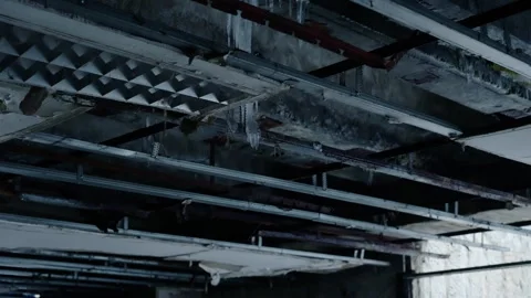 Icicles and Dripping Water in Underpass Ceiling Stock Footage 345415080