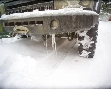 Icicles on a car bumper Stock Photos