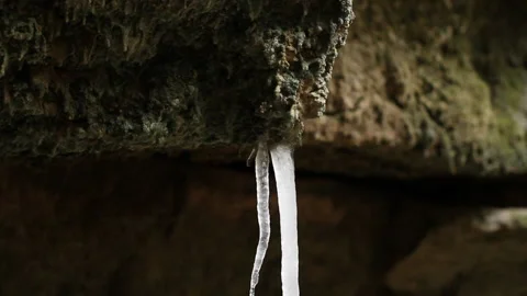 Icicles in a cave Stock Footage 148487561