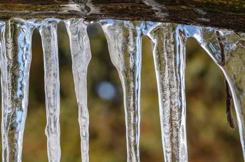 Icicles close-up view. Icicles close up. Icicles macro view. Icicles winter v Stock Photos