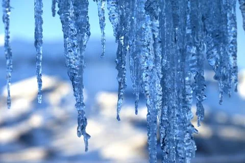 Icicles in cold winter evening Stock Photos