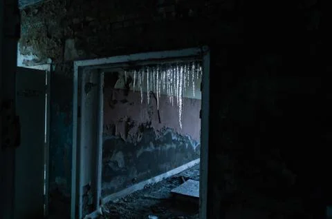 Icicles in a collapsed building Stock Photos
