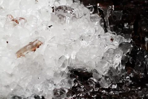 Icicles on dark background Stock Photos