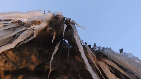 Icicles in Dirty Snow Stock Footage 98217592