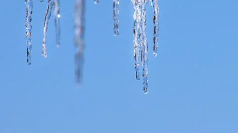 Icicles Dripping - rack focus with glint Stock Footage 10787820