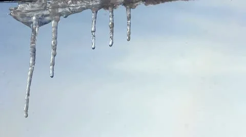 Icicles festoon the eaves - timelapse Stock Footage 16930122