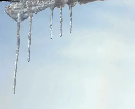 Icicles festoon the eaves - timelapse Stock Footage 17074807