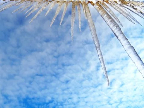 Icicles hanging from the edge Stock Photos