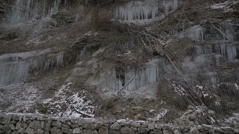 Icicles on a hill along the road Stock Footage 96382910