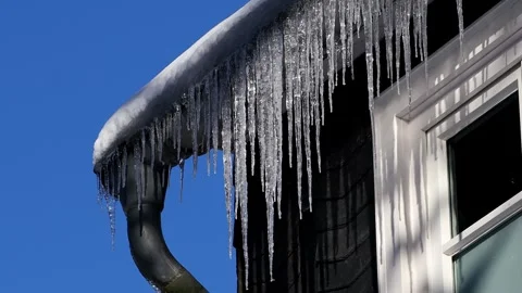 Icicles on a house in winter 4k 25fps video Stock-Footage 326412892