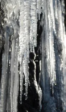 Icicles lit by the sun Stock Photos