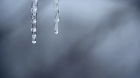 Icicles melting during a spring thaw in slow motion Video stock 93781854