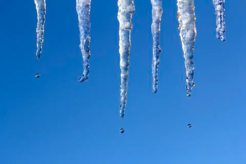Icicles Melting Stock Photos